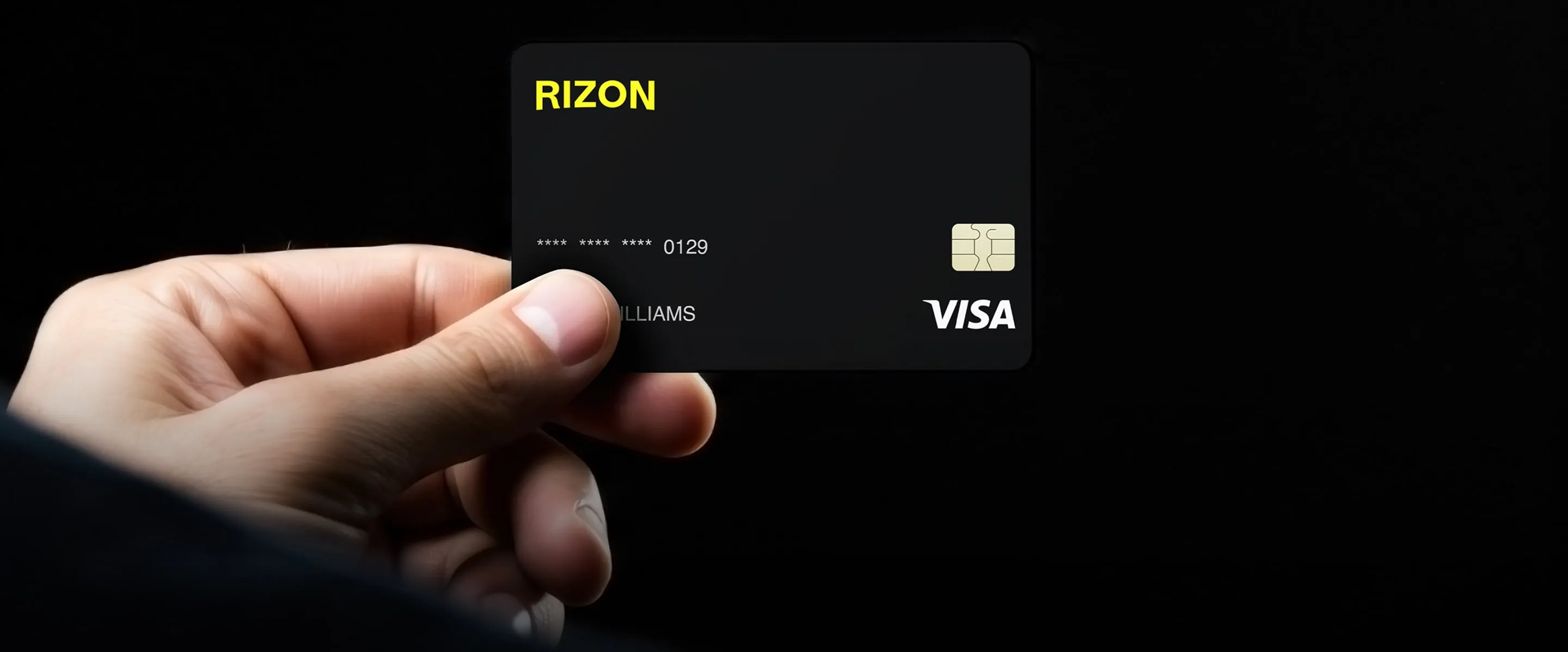 Rizon Visa card held in a hand